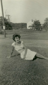 Great Aunt Ellie on lawn of my first childhood home with view of my second childhood home